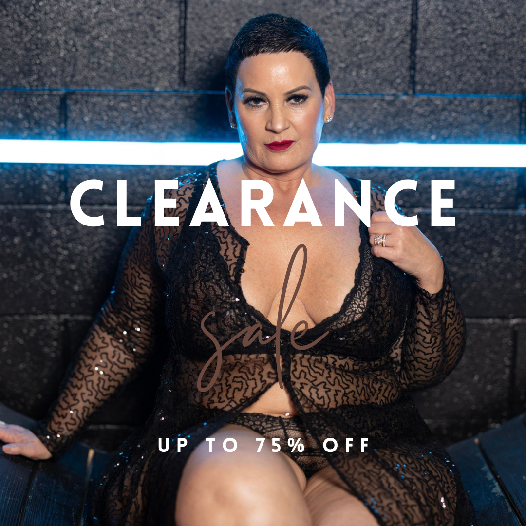 Plus size woman modeling black lace lingerie in plus size lingerie clearance up to 75 percent off